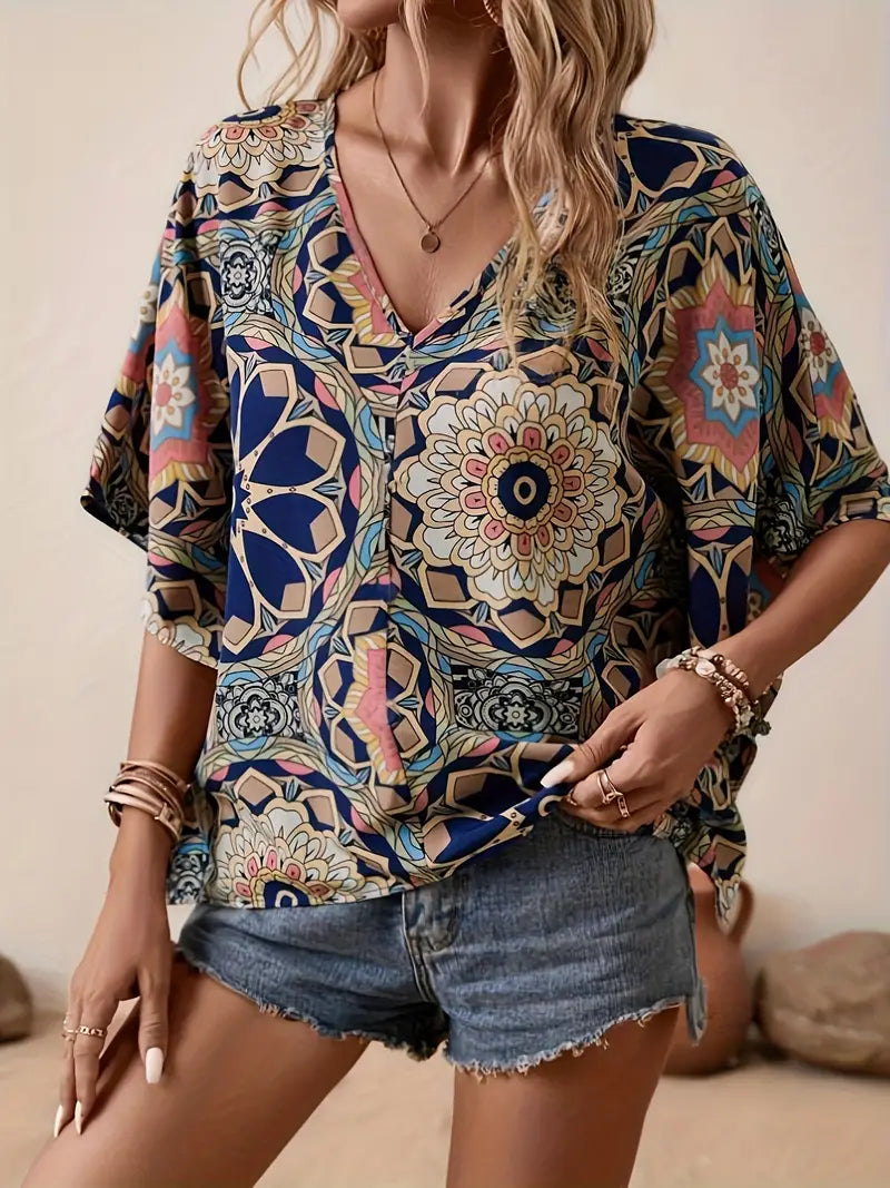 Olivia - Blouse with floral motif and V-neckline