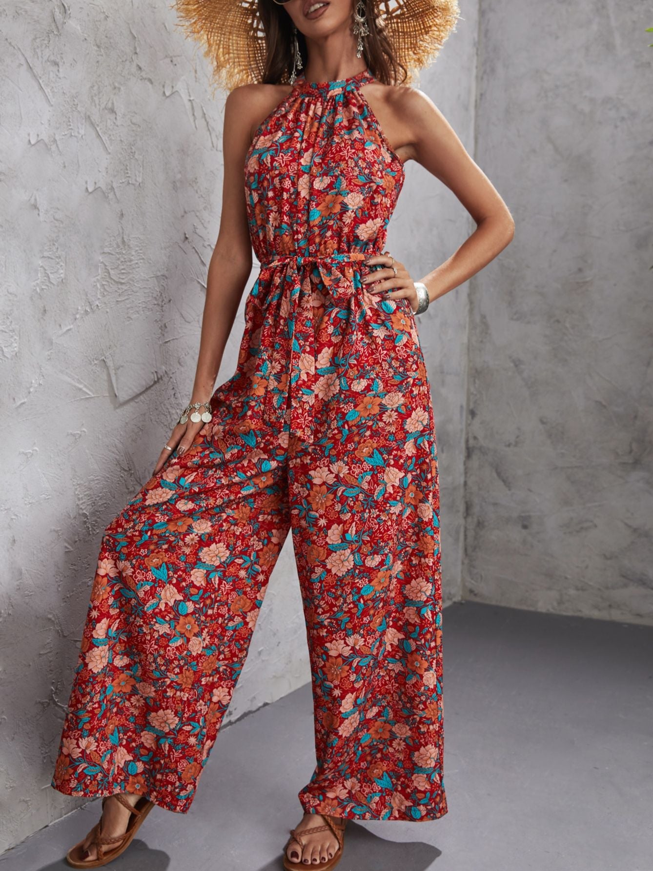 Hattie - Gebloemde halter jumpsuit