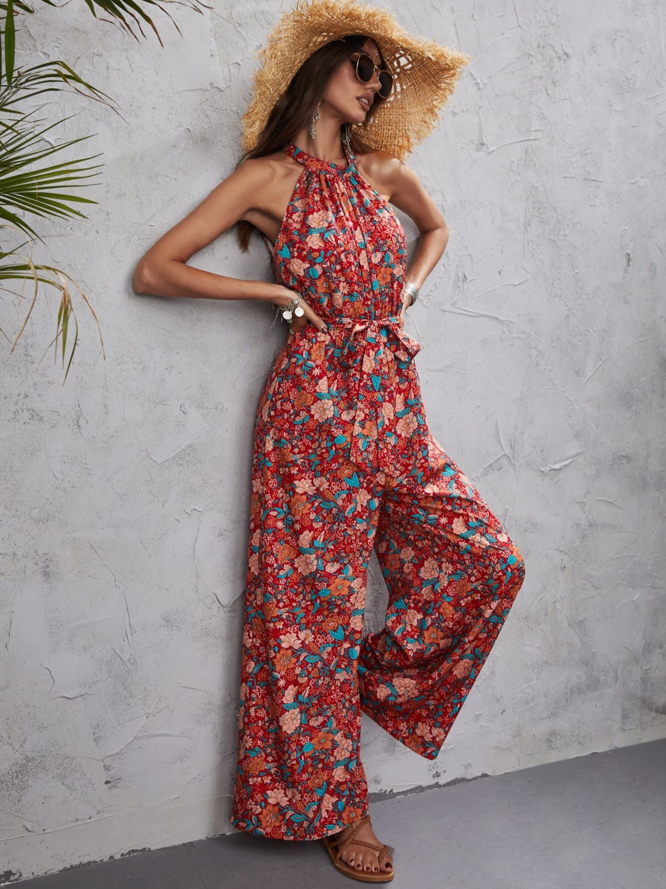 Hattie - Gebloemde halter jumpsuit