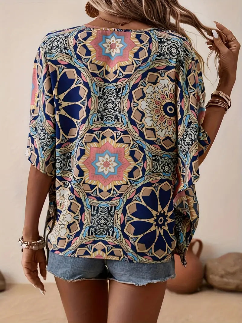 Olivia - Blouse with floral motif and V-neckline