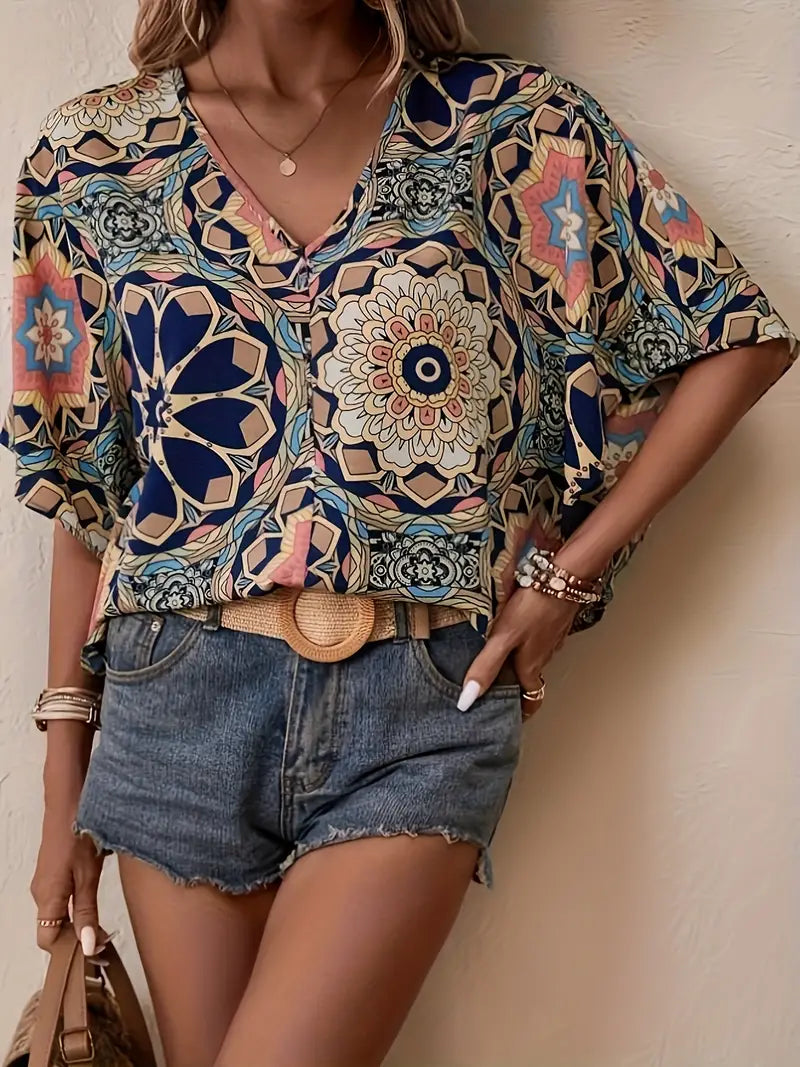 Olivia - Blouse with floral motif and V-neckline