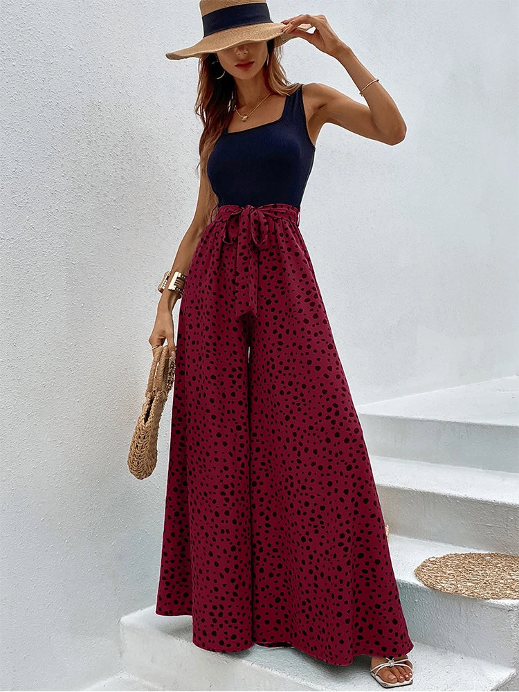 Kelly - Jumpsuit met wijde pijpen en stippenprint