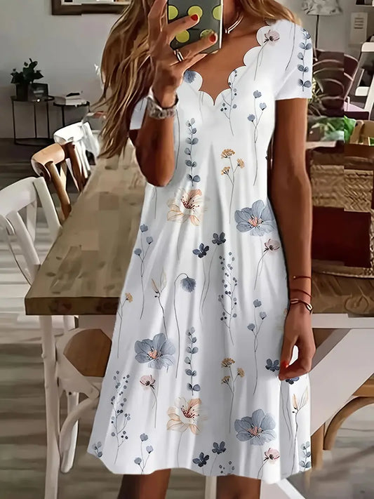 Charlotte - Robe à motifs fleuris et décor coquillage